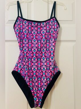 TYR Neon Aztec Durafast Swimsuit in Pink and Teal with Black Straps.